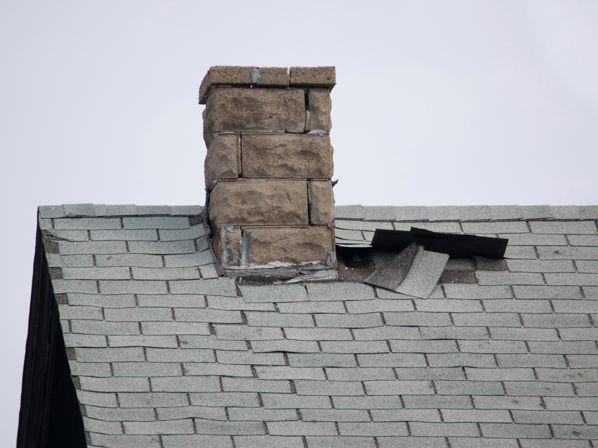 Seal Down asphalt shingles roof lifted by wind